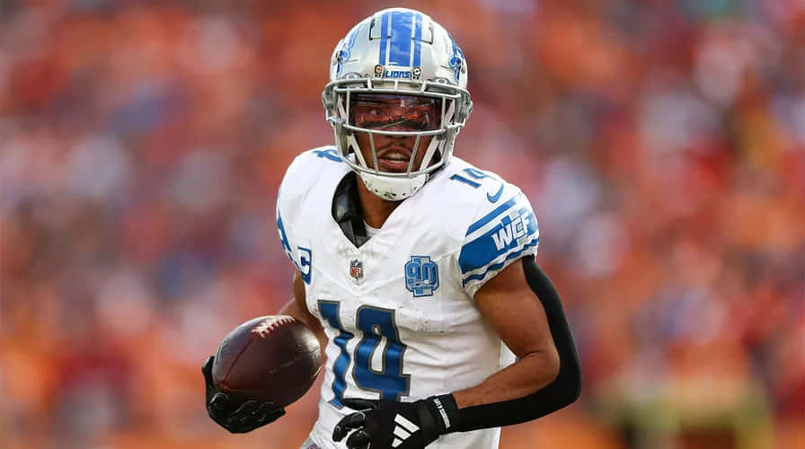 Amon Ra St Brown Detroit Lions Game Action Wallpaper