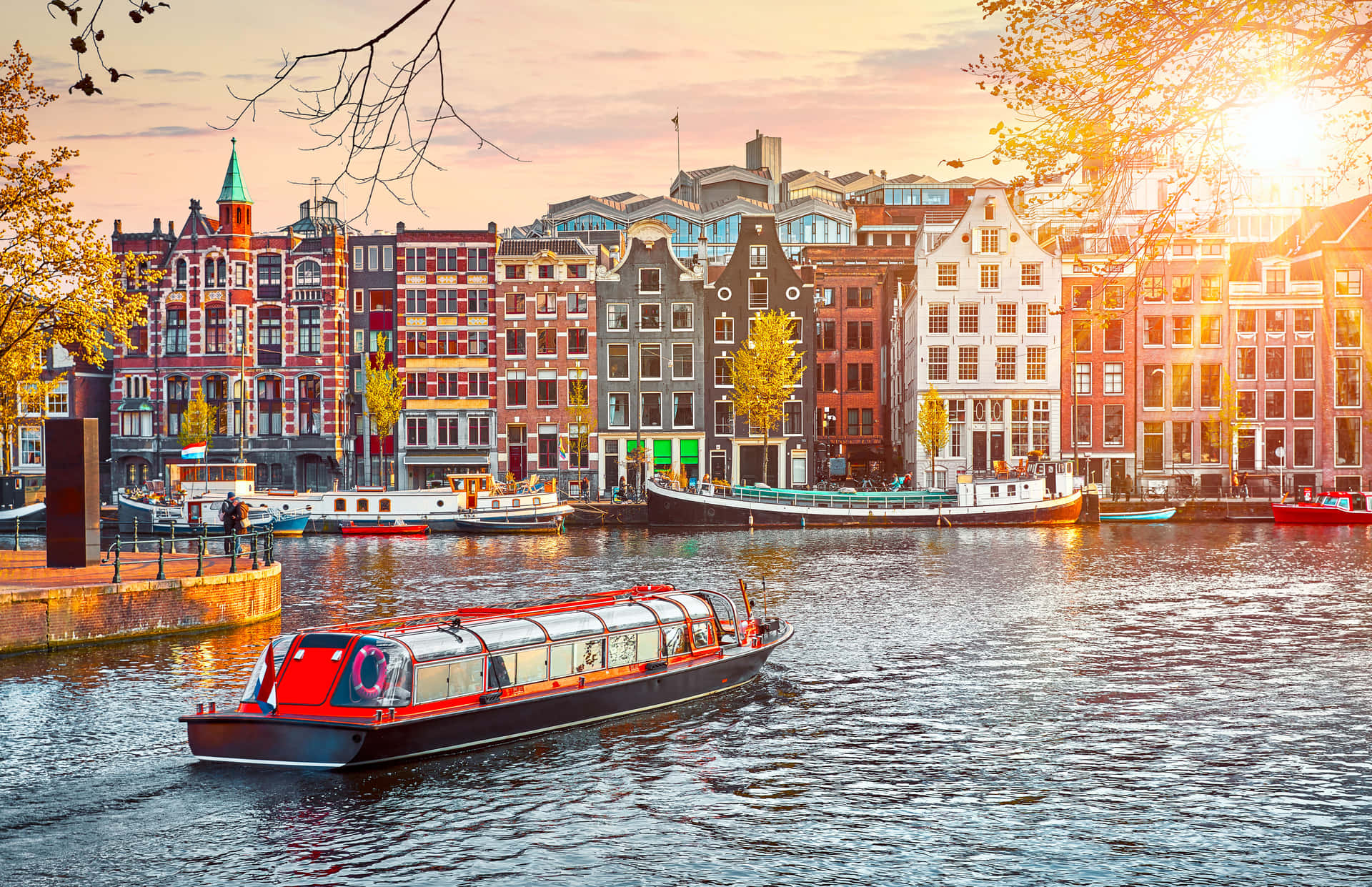 Amsterdam Canal Tour Boat Sunset Wallpaper