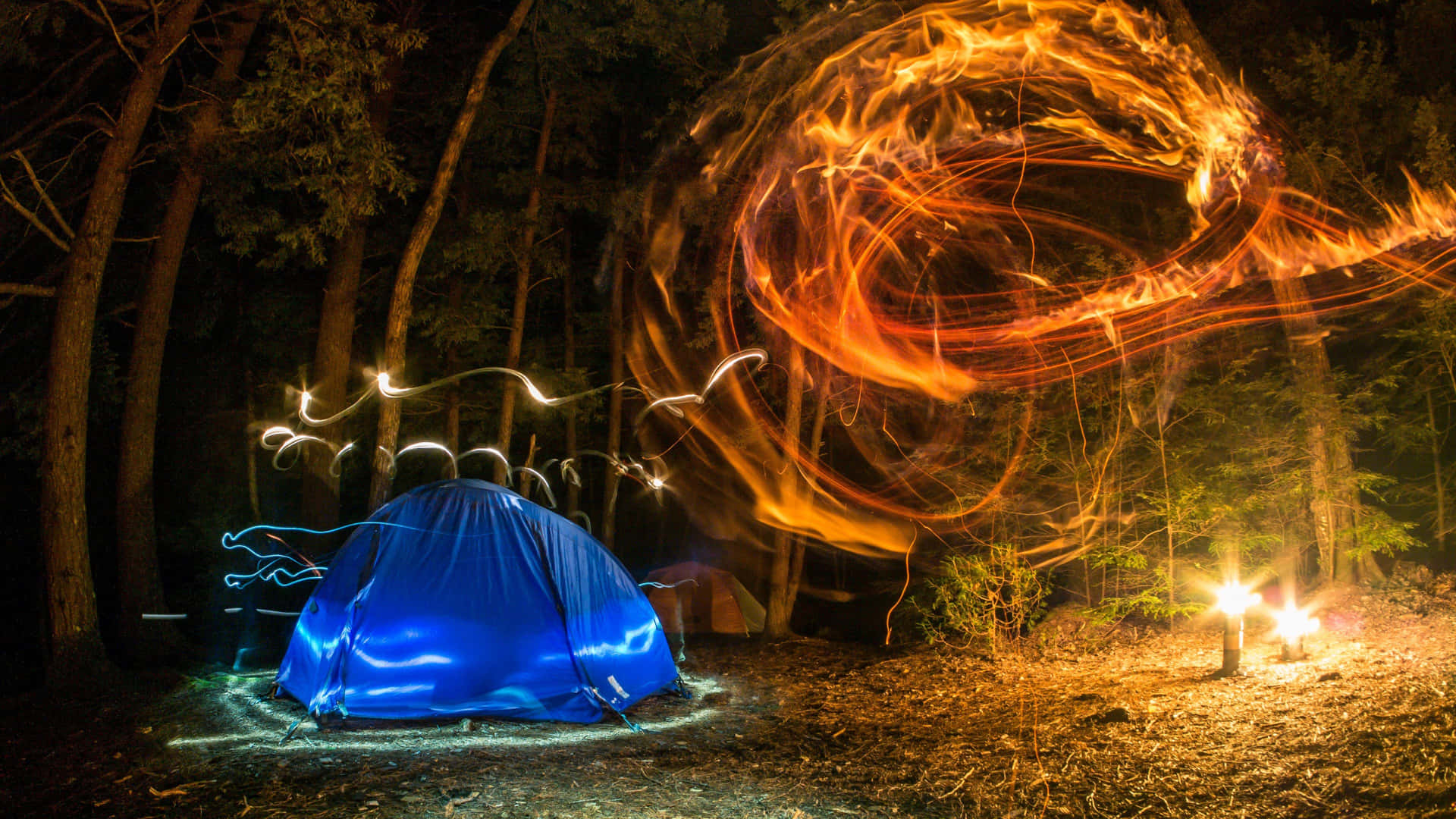 An Adventurous Outdoor Camping Night Wallpaper