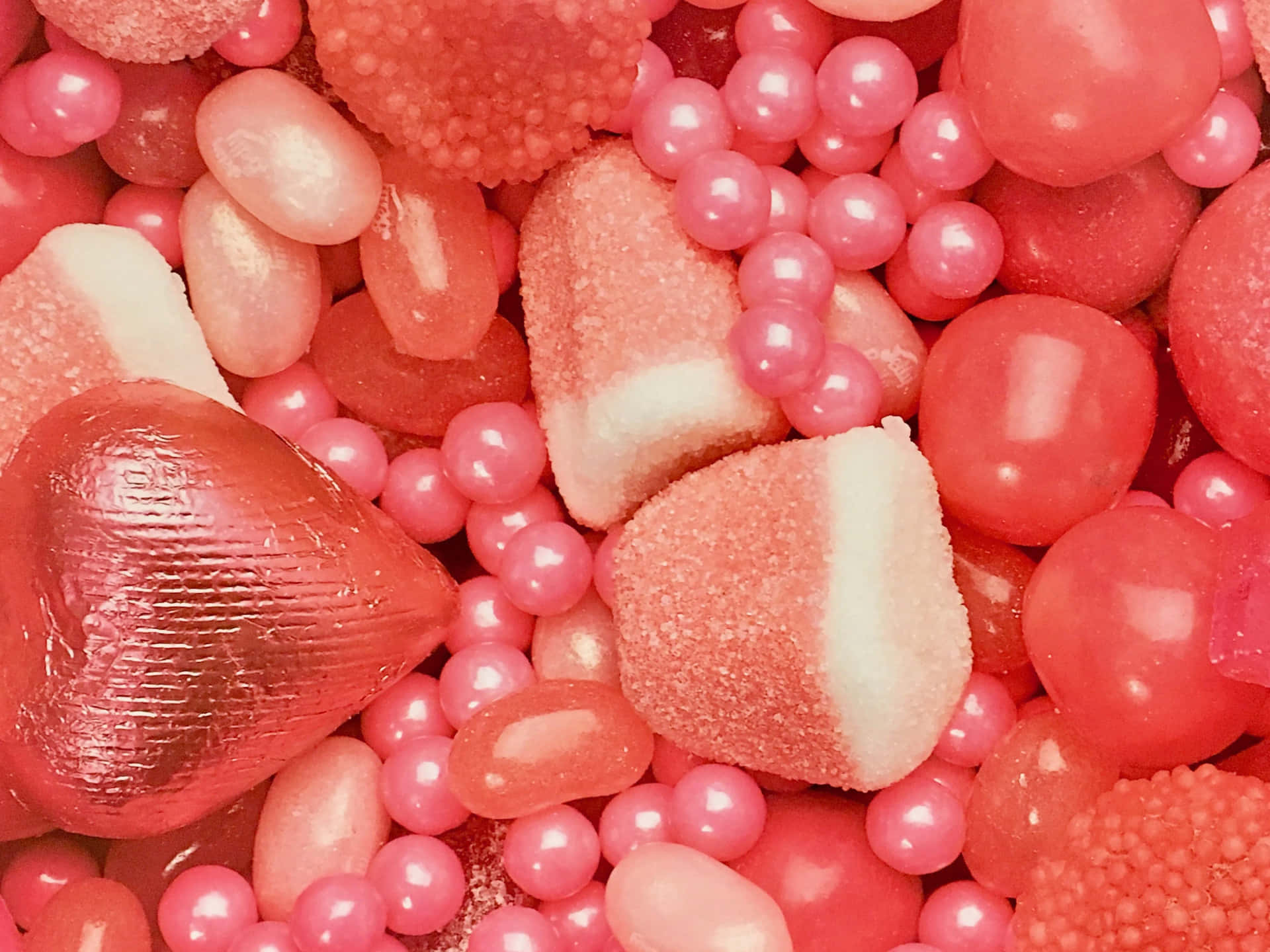 An Alluring Display Of Pink Candies Wallpaper