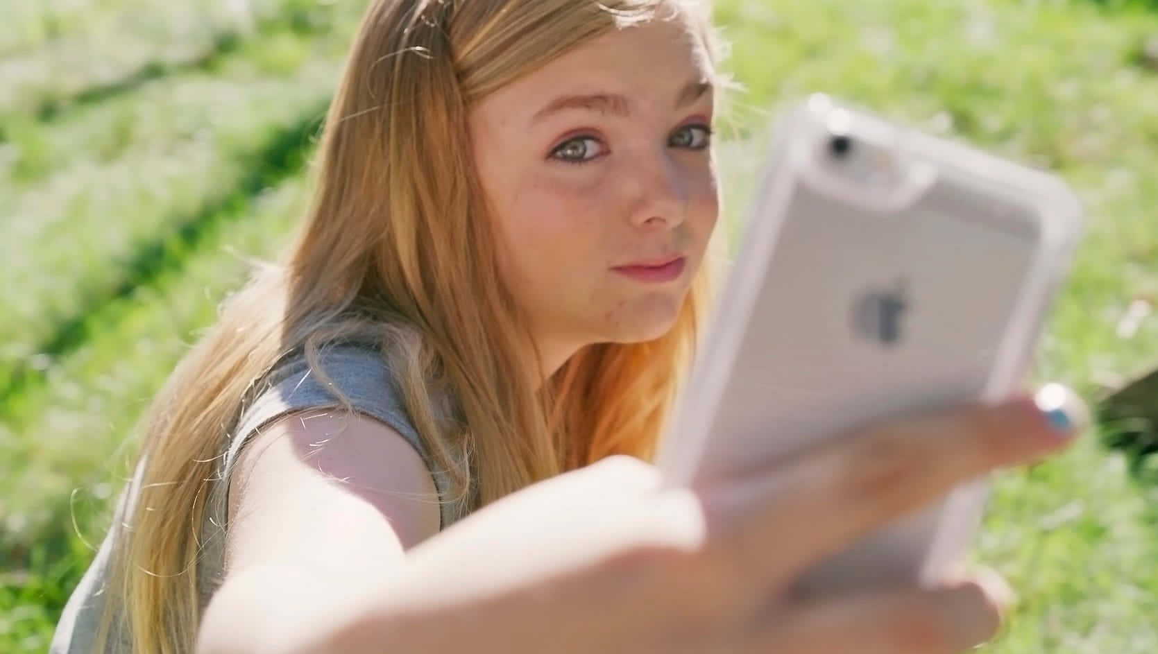 An Eighth Grade Girl Absorbed In Her Digital World Wallpaper