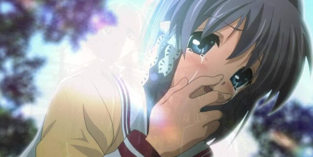 An Emotional Scene From The Anime Clannad Showing The Main Characters Nagisa And Tomoya Wallpaper