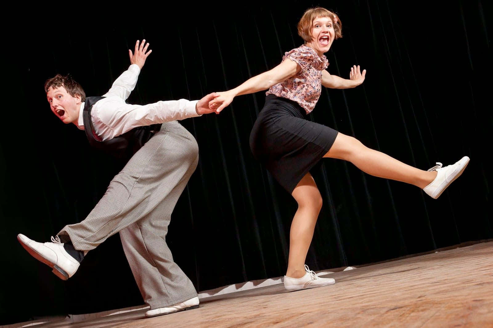 An Enthralling Moment Of Swing Dance Wallpaper