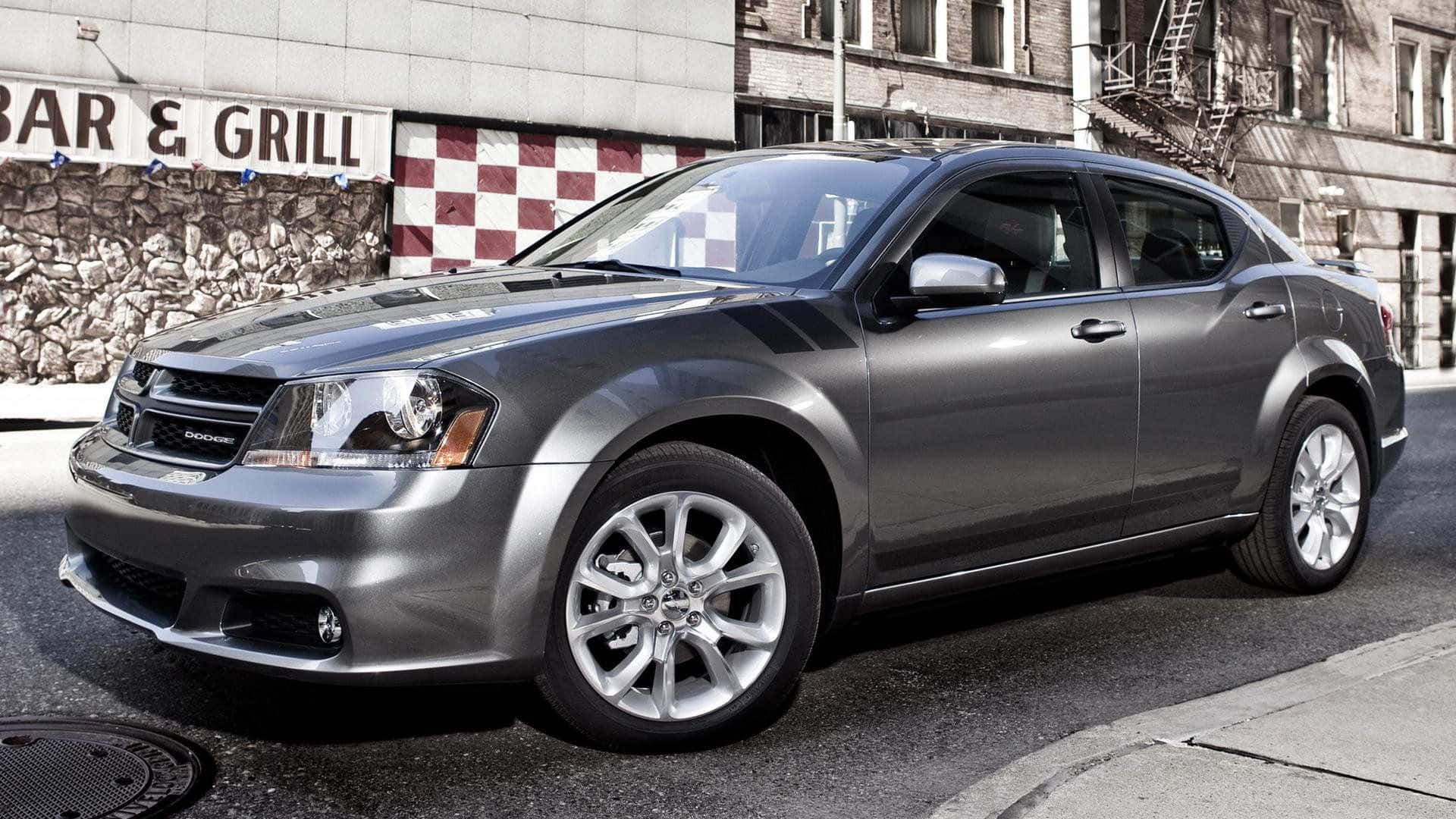 An Impeccable Silver Dodge Avenger Showcasing Elegance And Power Wallpaper