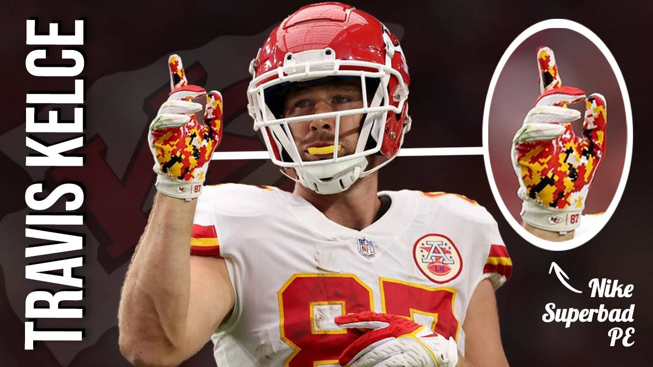 An Intense Moment Of Nfl Star, Travis Kelce In Action Wallpaper