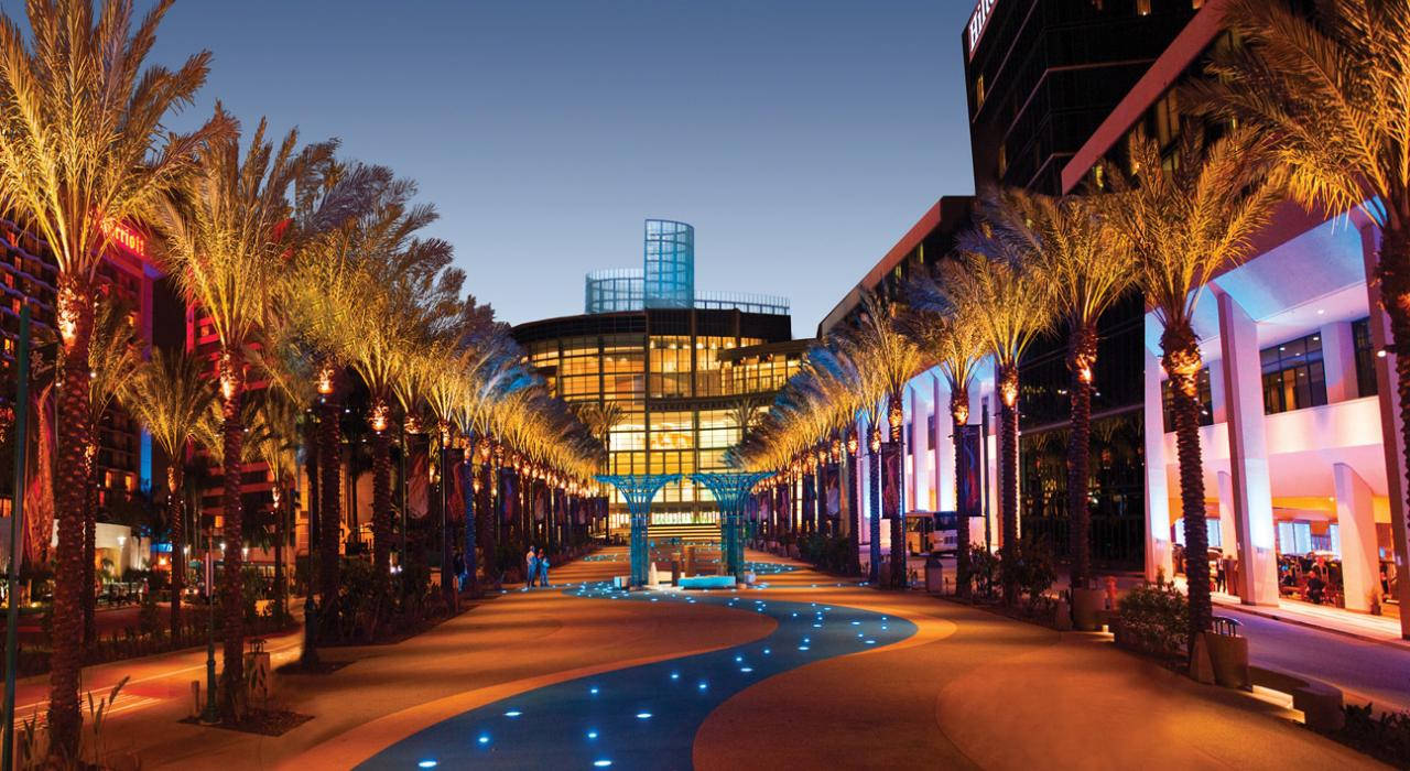 Experience Anaheim at night - the vibrant Anaheim Convention Center is lit up against an inky sky. Wallpaper