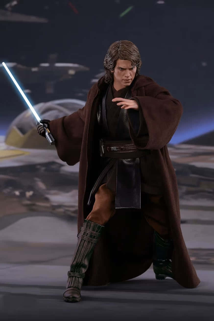 Anakin Skywalker Action Figure With Lightsaber Wallpaper