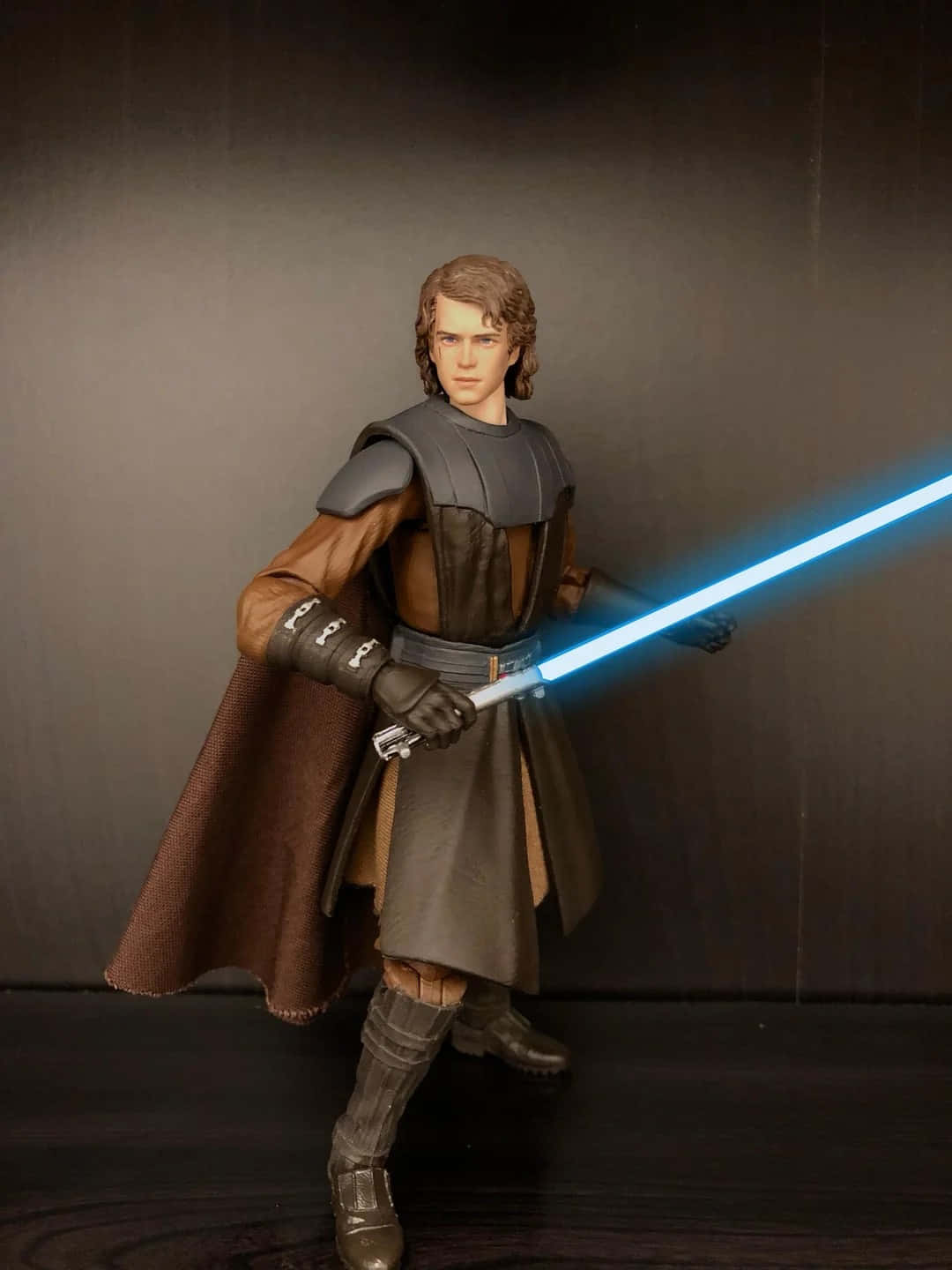 Anakin Skywalker Figure With Lightsaber Wallpaper