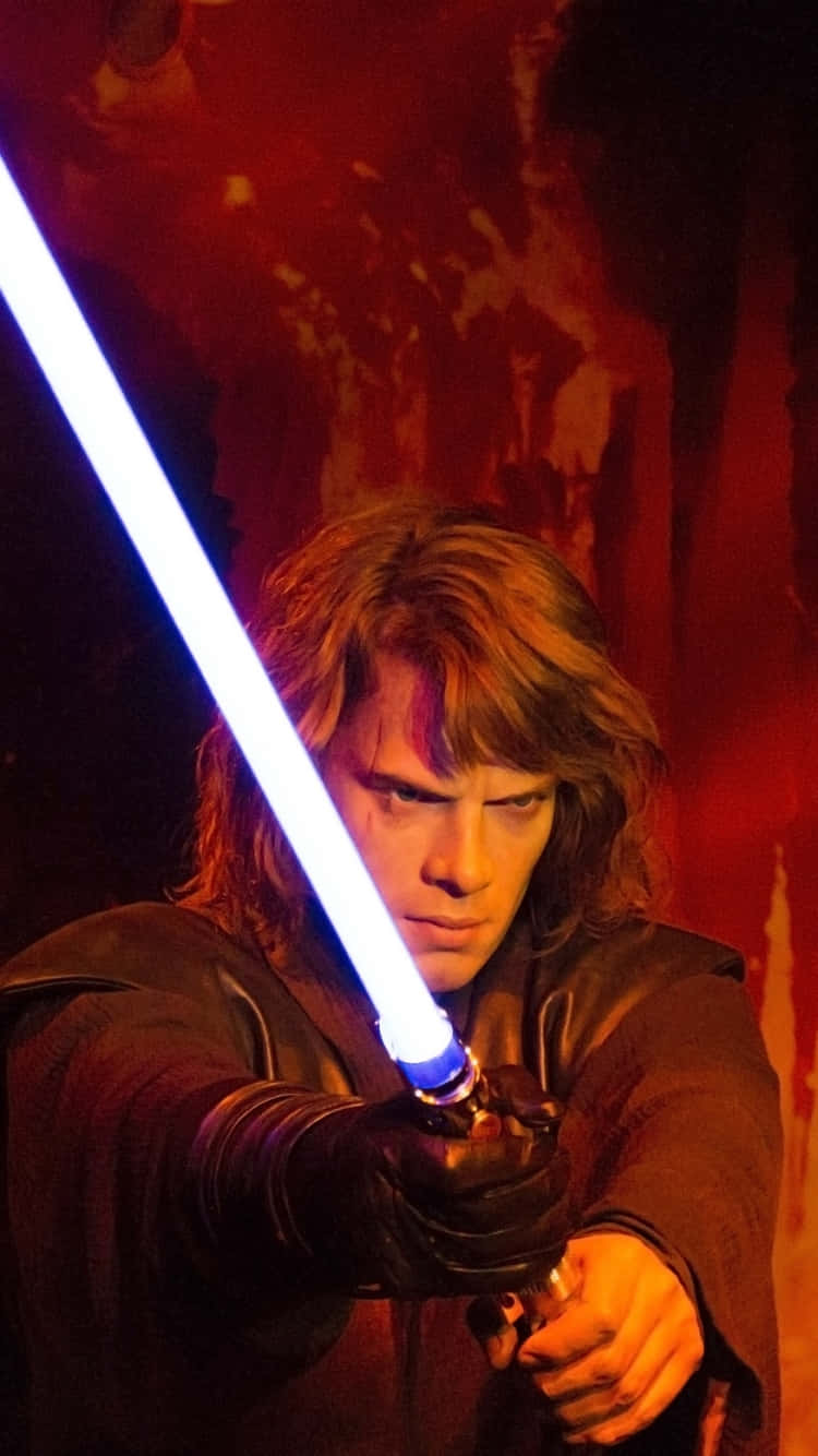 Anakin Skywalker With Blue Lightsaber Wallpaper