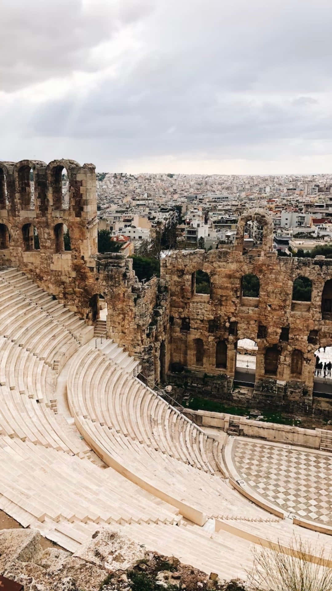 Ancient_ Amphitheater_ Overlooking_ Cityscape.jpg Wallpaper