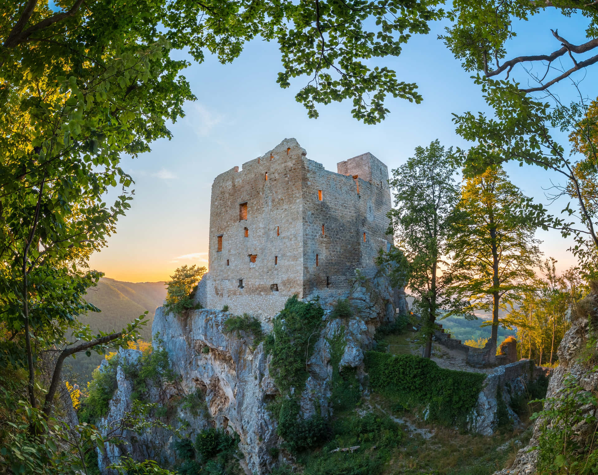 Ancient Castle Cliffside Sunset Wallpaper