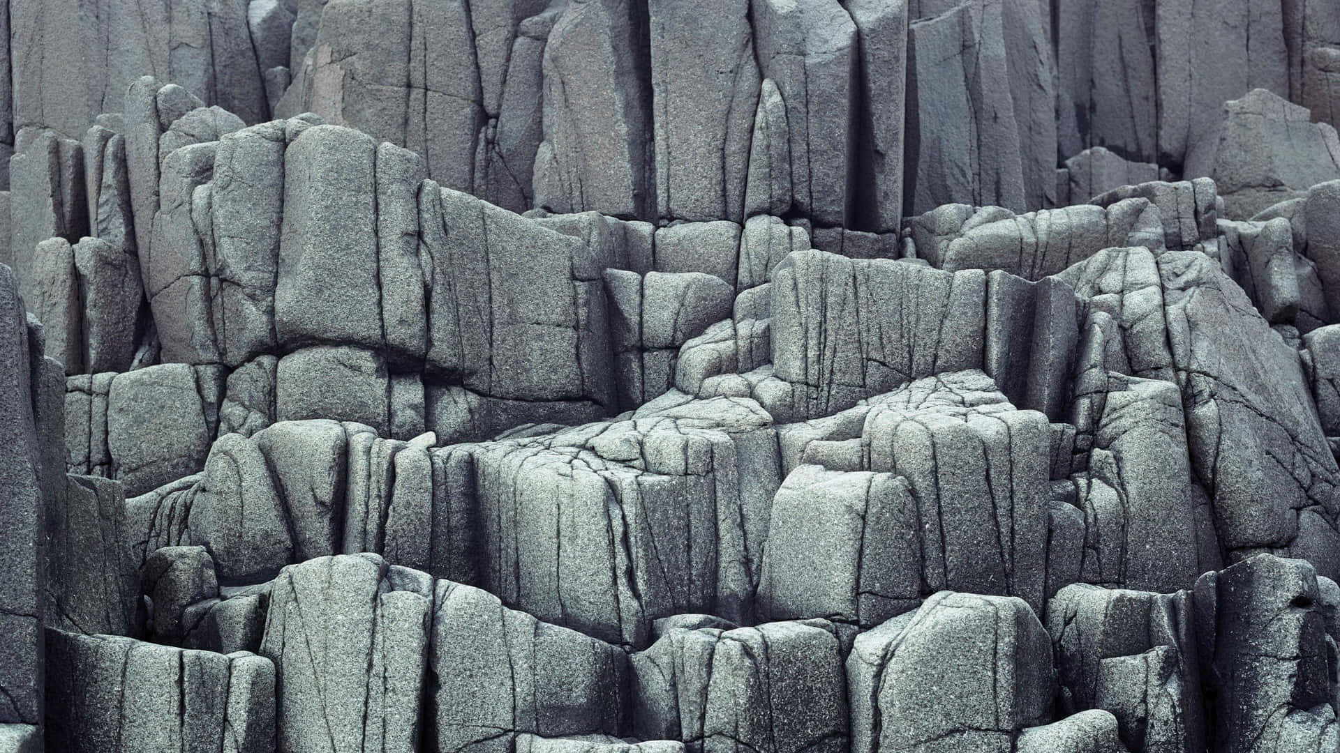 Ancient Columnar Basalt Rocks Formation Wallpaper