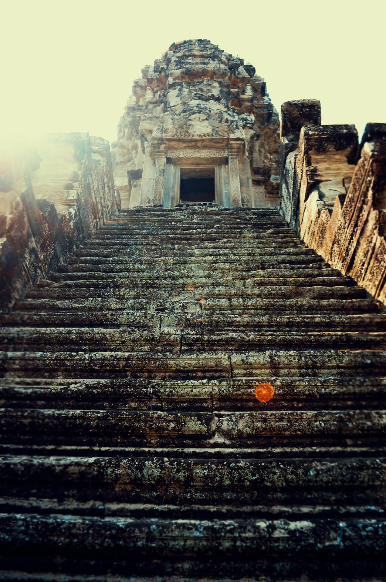 Antikatrappan I Angkor Wat-ruinerna (for A Computer Or Mobile Wallpaper Featuring An Image Of An Ancient Staircase In The Ruins Of Angkor Wat) Wallpaper
