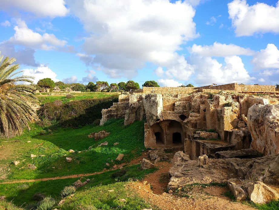Ancient Tombs Under Open Sky Wallpaper
