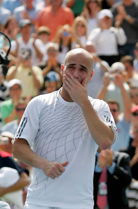 Andre Agassi In Action On The Tennis Court Wallpaper