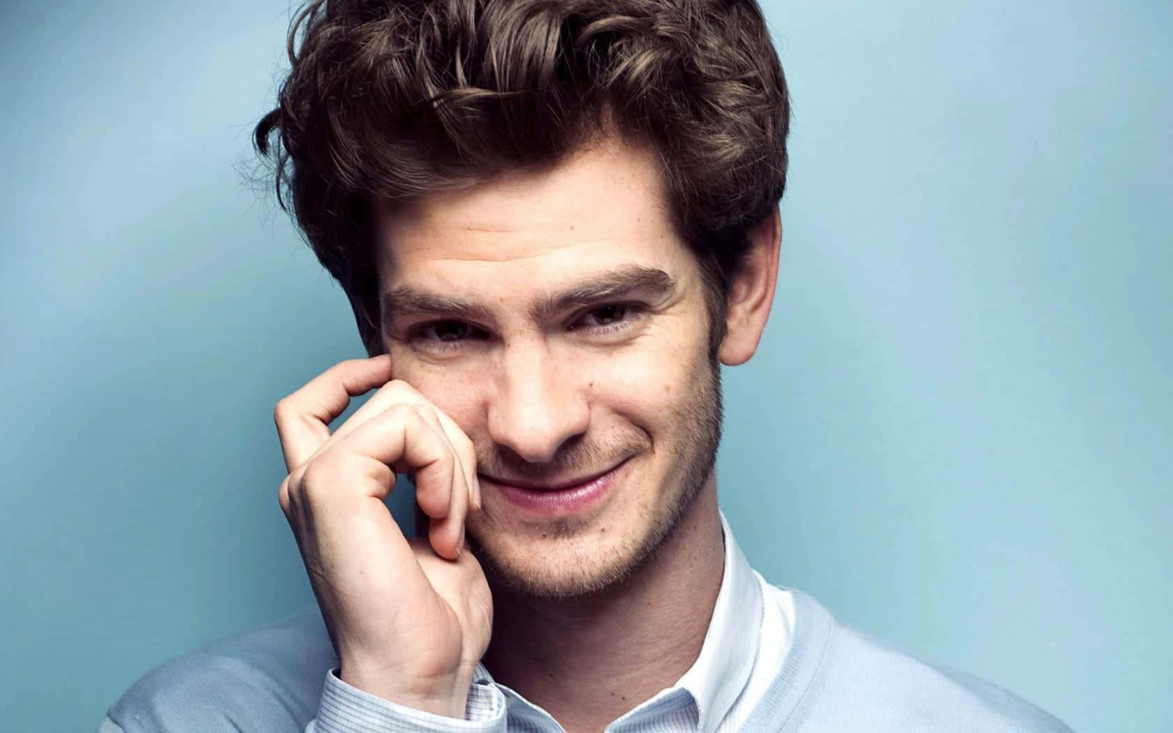 Andrew Garfield strikes a pose on the red carpet.