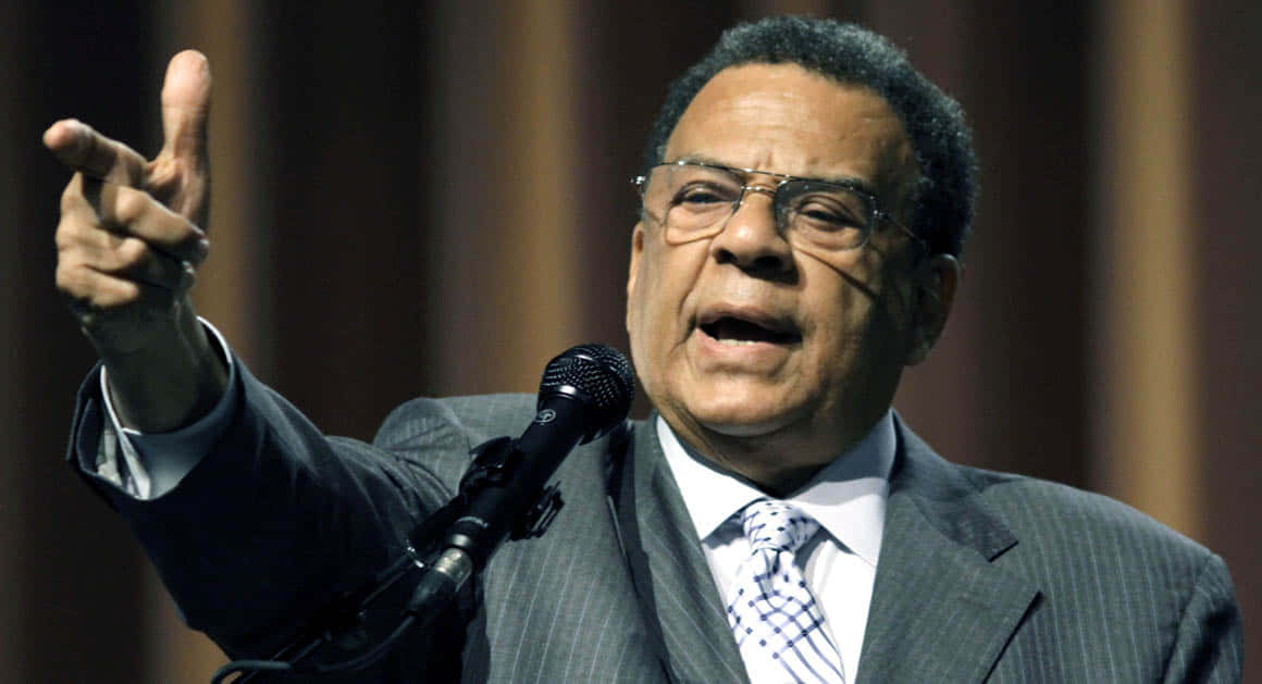 Andrew Young Pointing From Podium Wallpaper