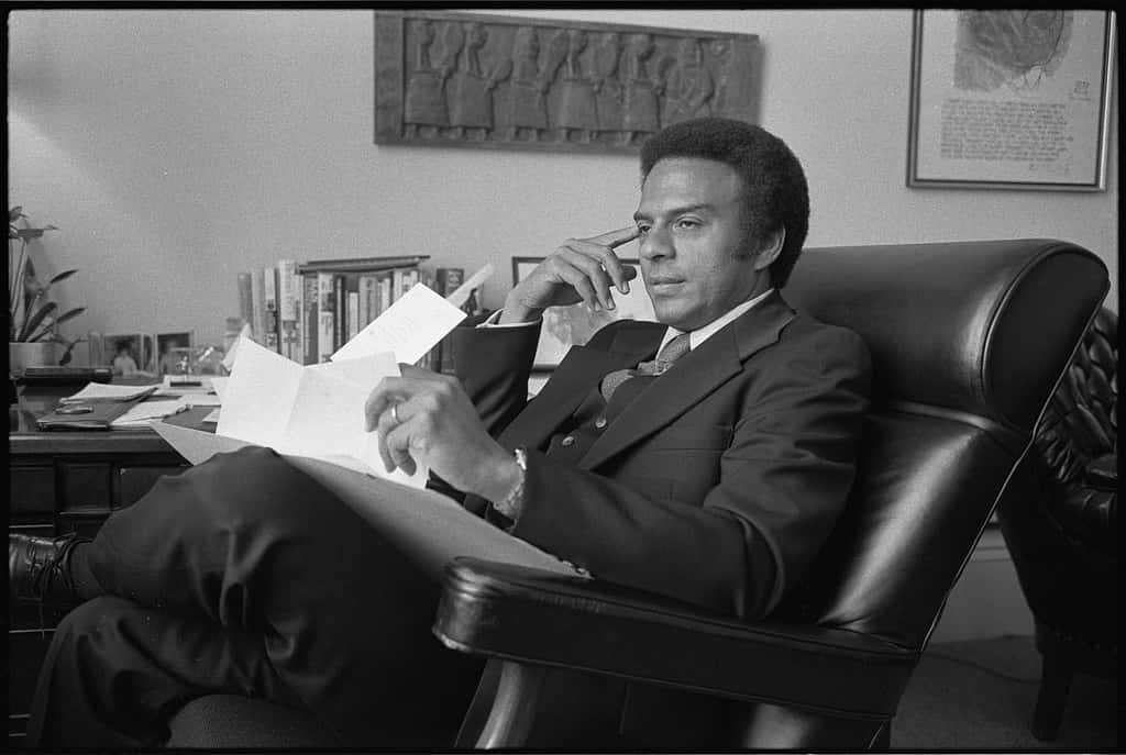 Andrew Young Relaxing In Office Wallpaper