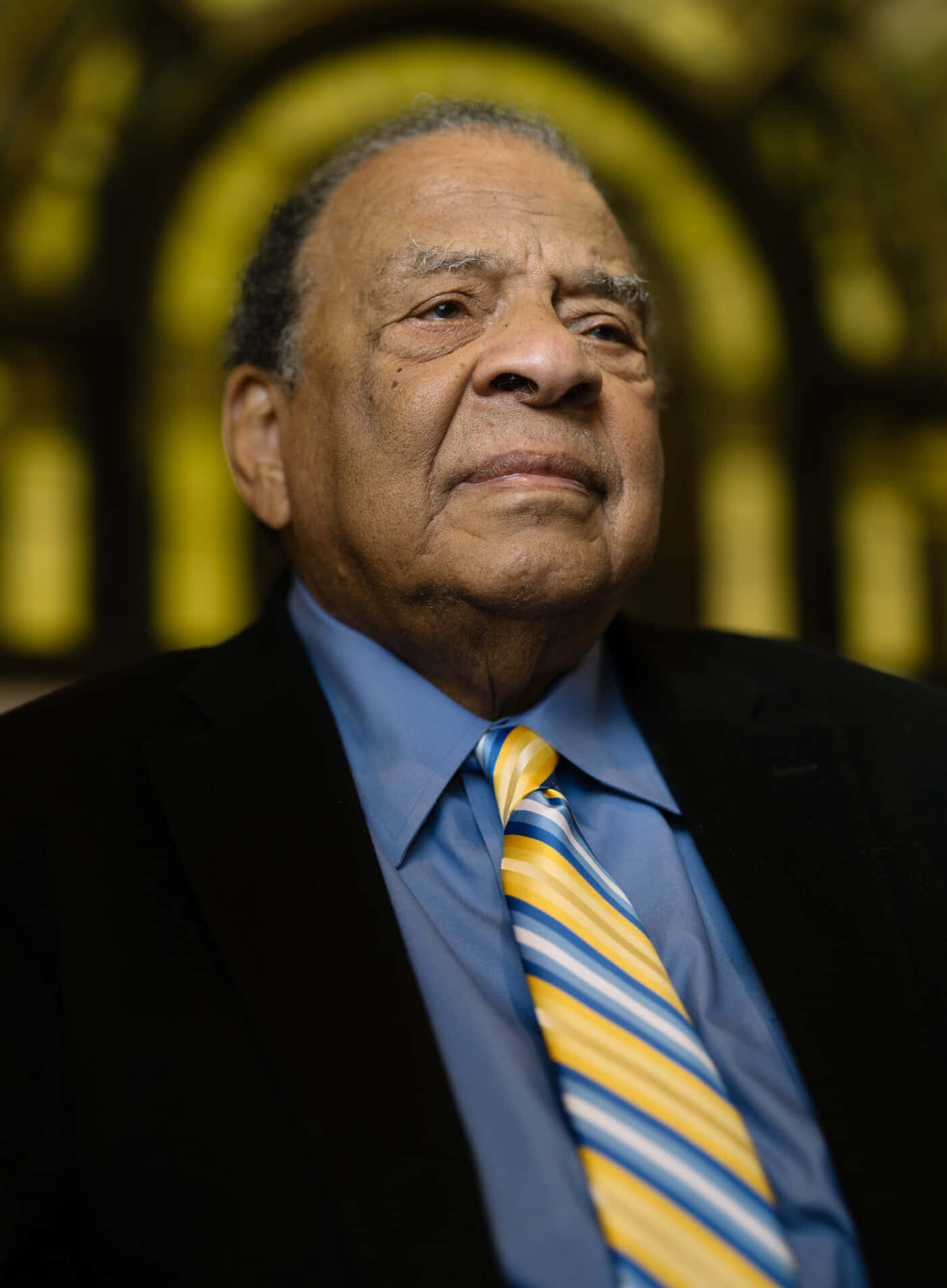 Prominent Civil Rights Activist Andrew Young Reflecting in Church Wallpaper