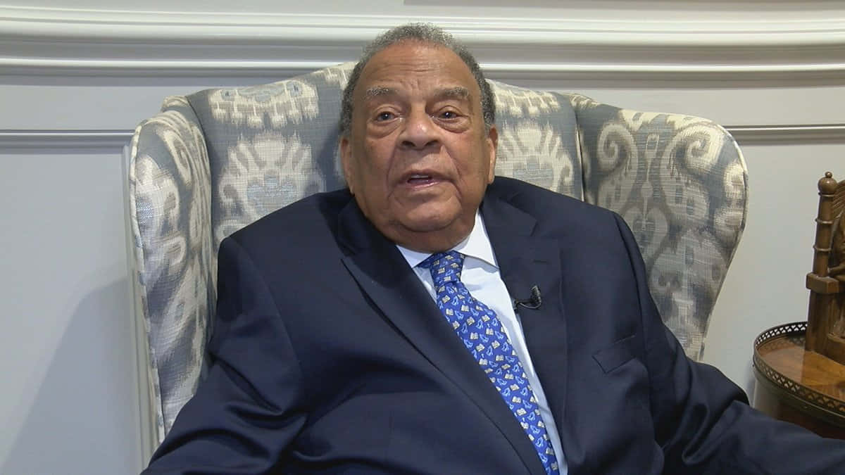 Accomplished Politician Andrew Young Discussing Important Topics During Interview Wallpaper