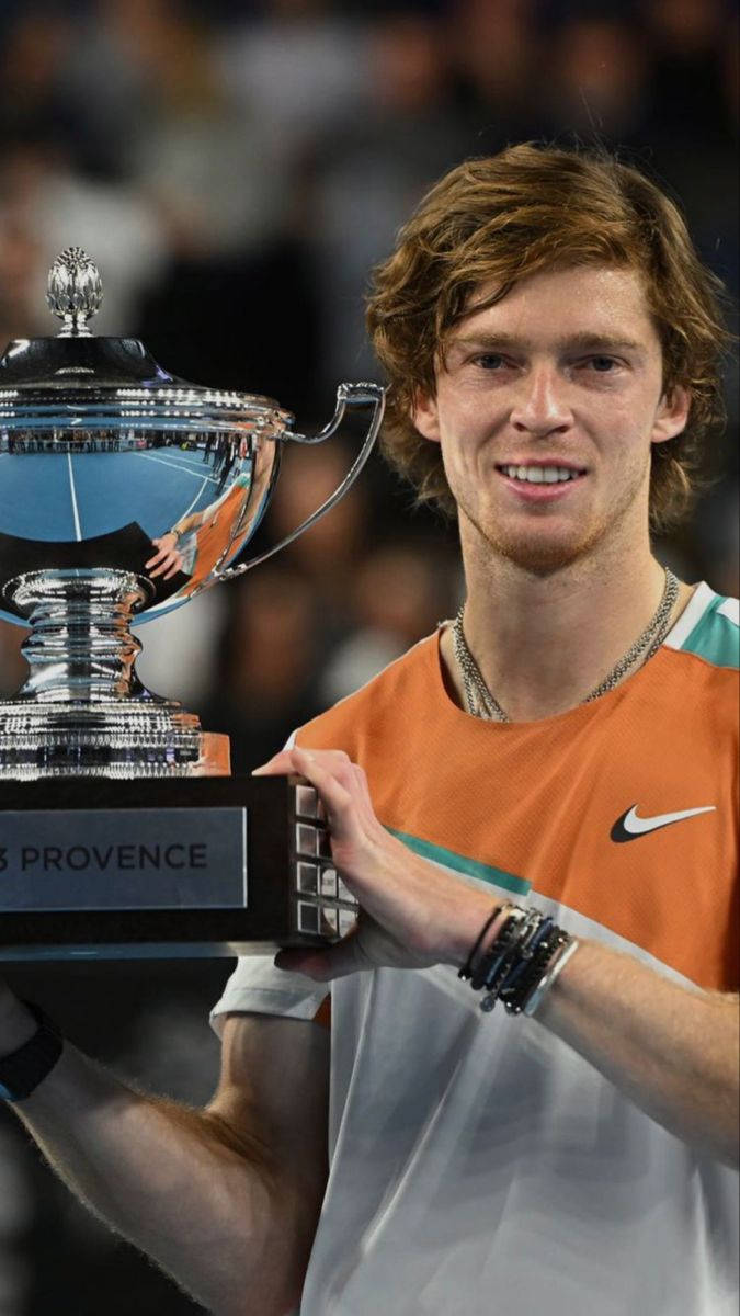 Andrey Rublev With Silver Trophy Wallpaper