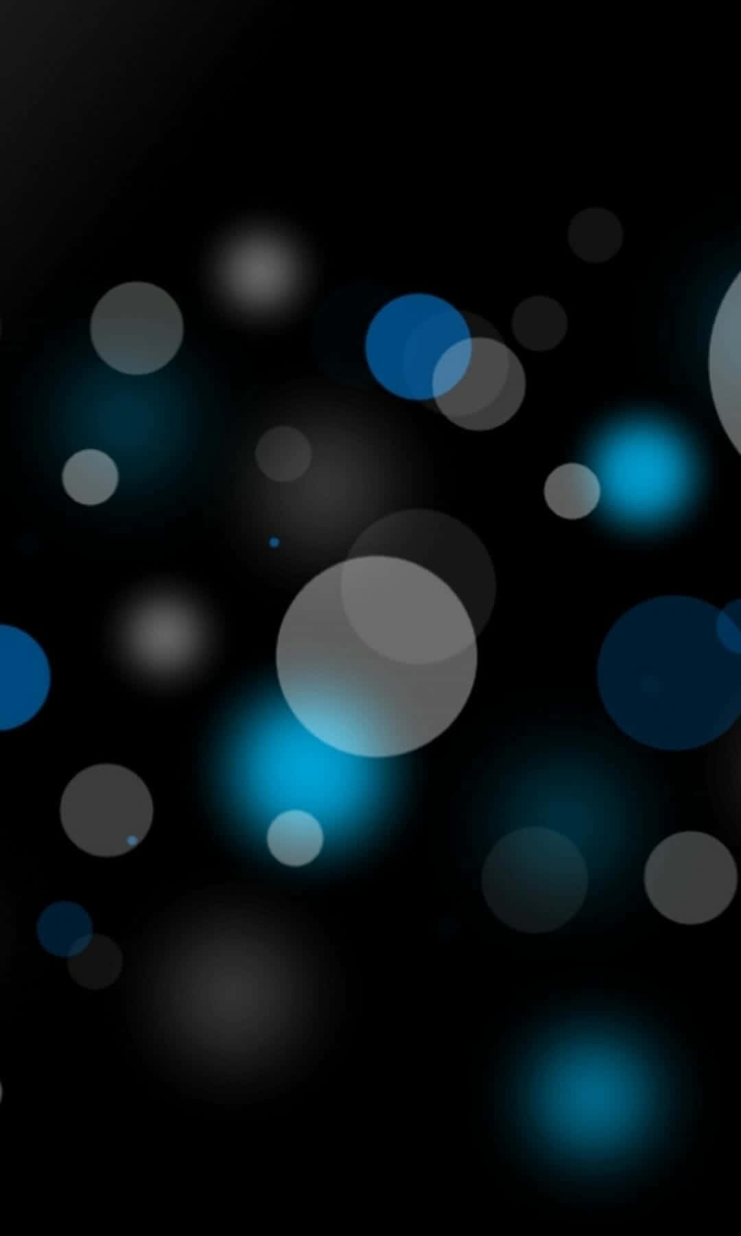 Blue And White Circles On A Black Background Wallpaper