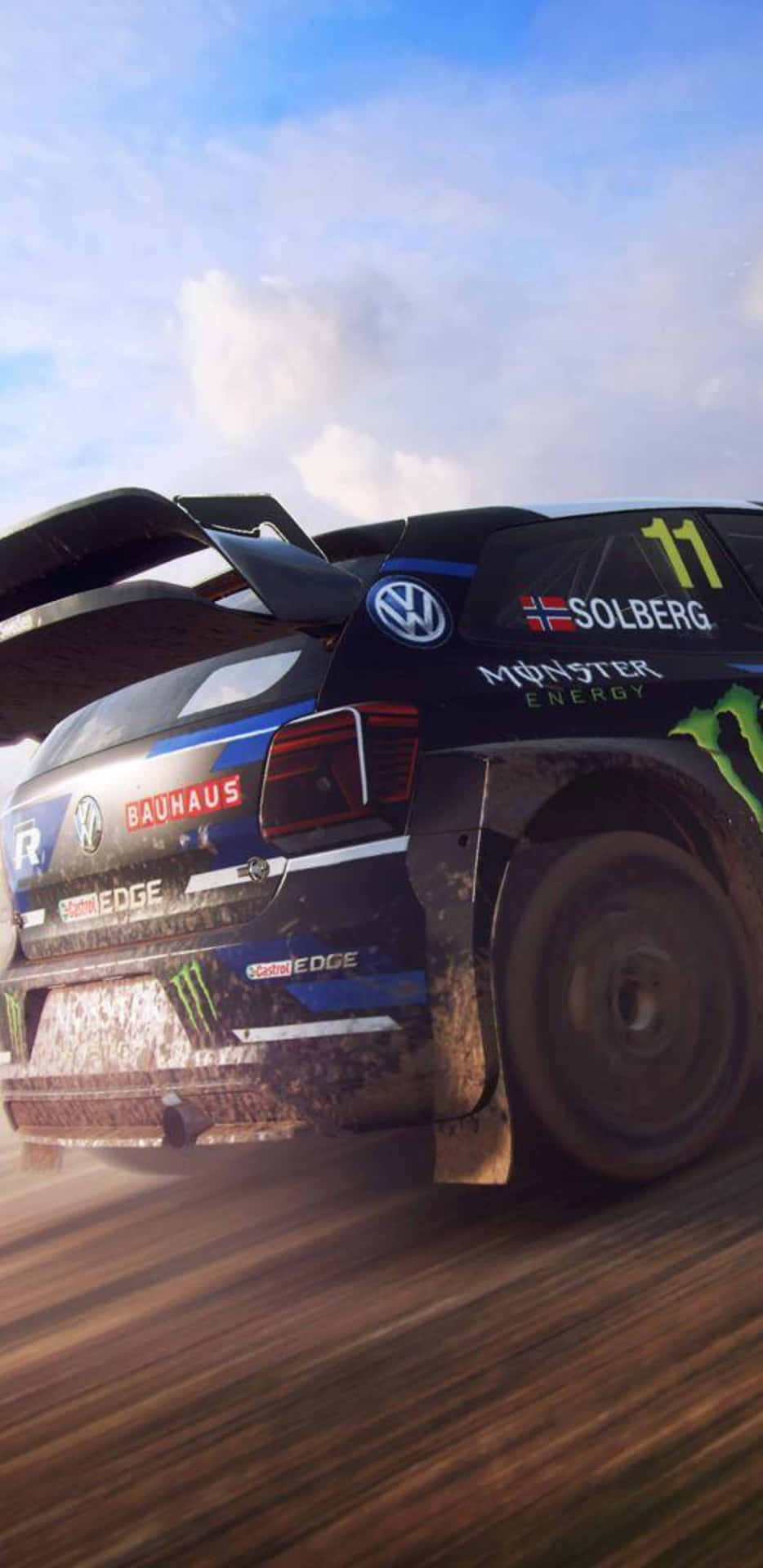 A Volkswagen Rally Car Driving On Dirt