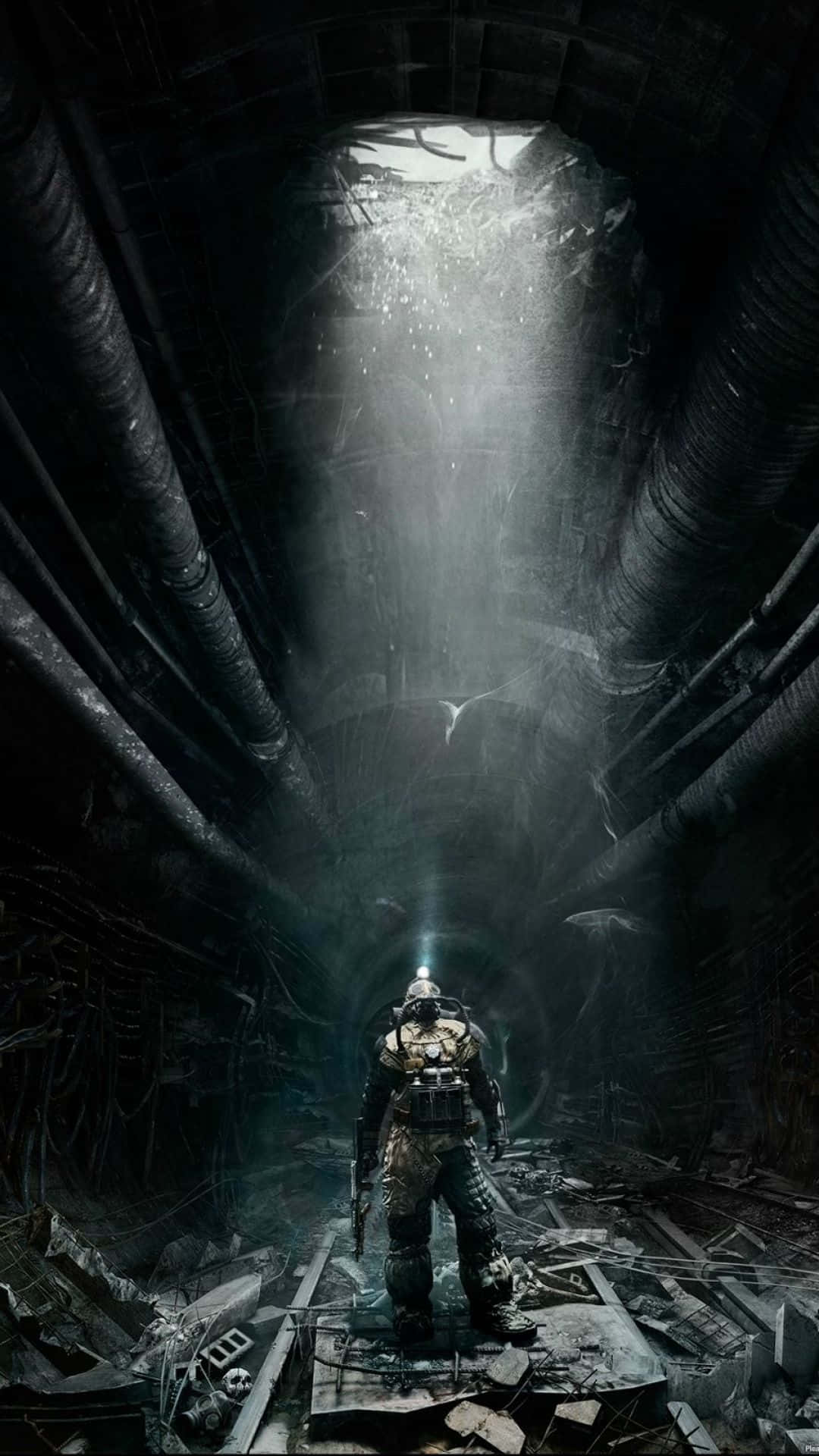A Man Standing In An Underground Tunnel
