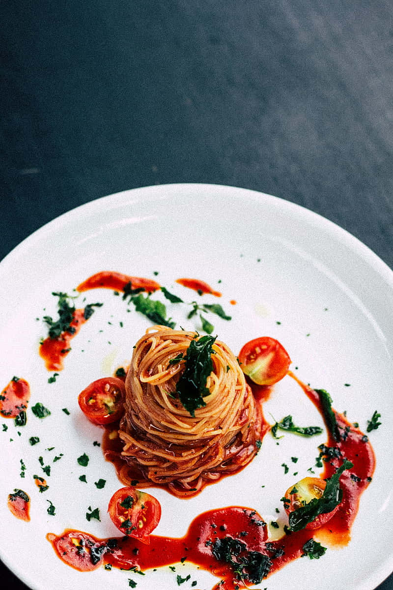 Androidhintergrundbild: Spaghetti Alla Napoletana Auf Einem Teller
