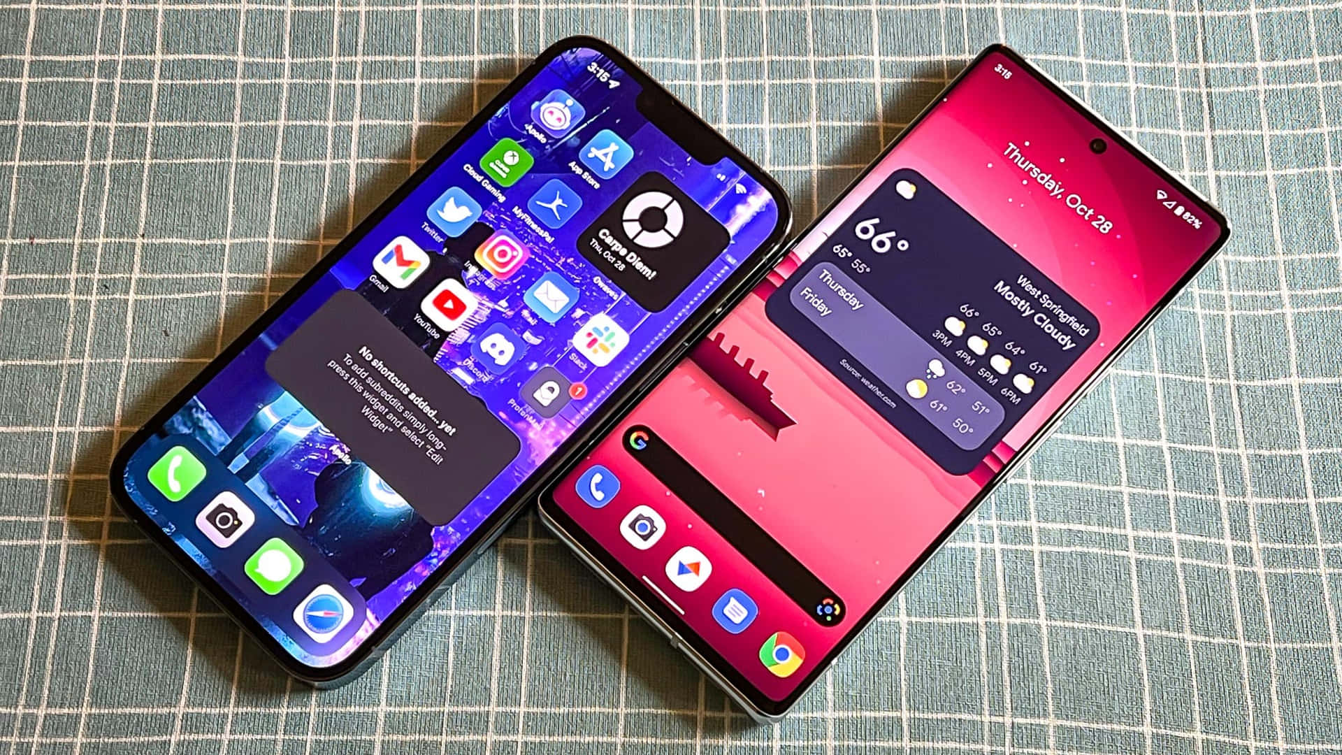 Two Iphones Are Shown Side By Side On A Table