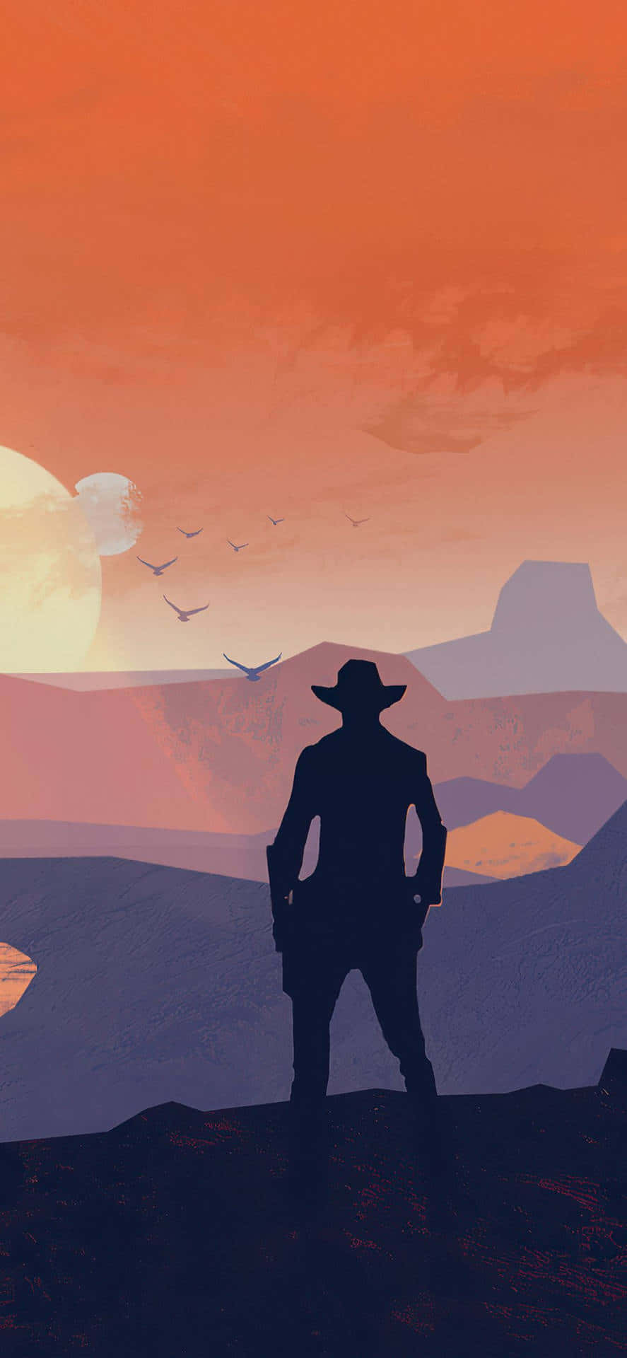 a man in a cowboy hat standing on a hill
