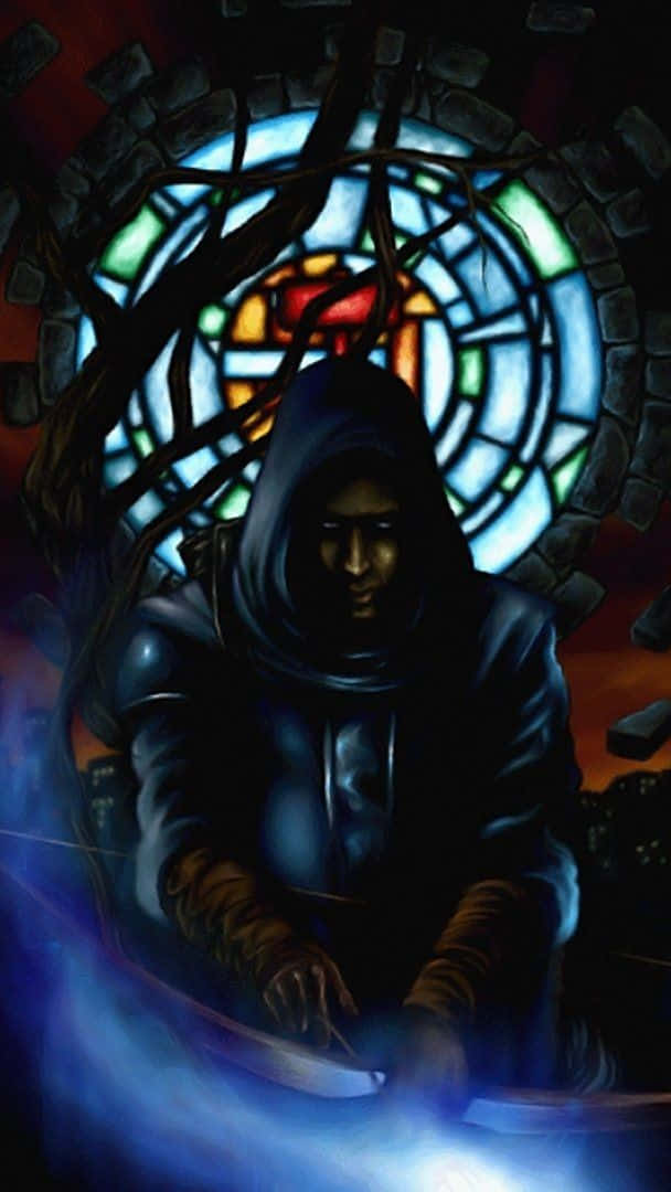 A Man In A Hooded Robe Is Sitting In Front Of A Stained Glass Window