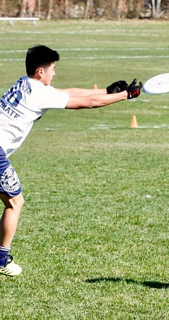 Athlete With Arms Out During Android Ultimate Frisbee Background