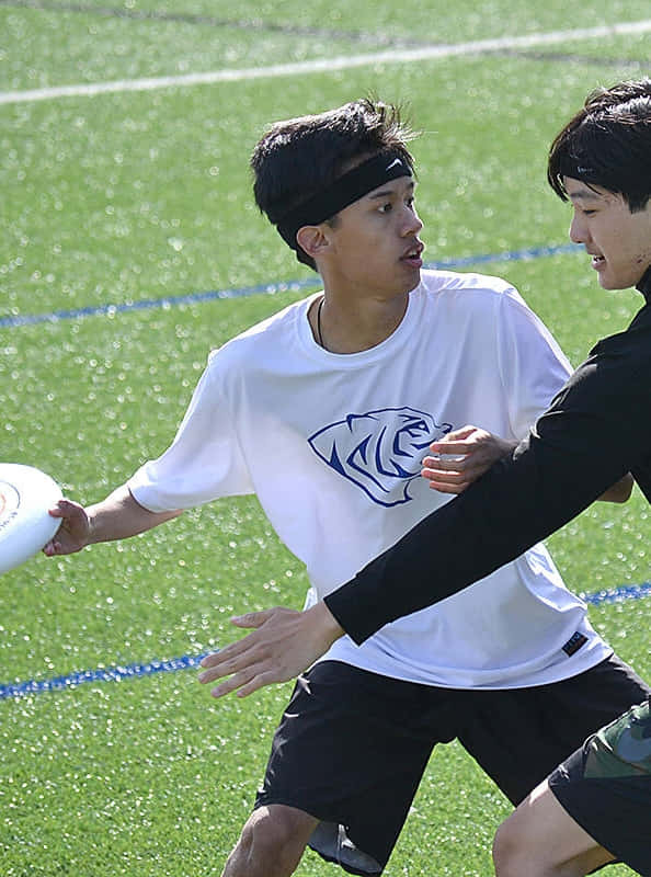 Asian Male Athletes Playing Android Ultimate Frisbee Background