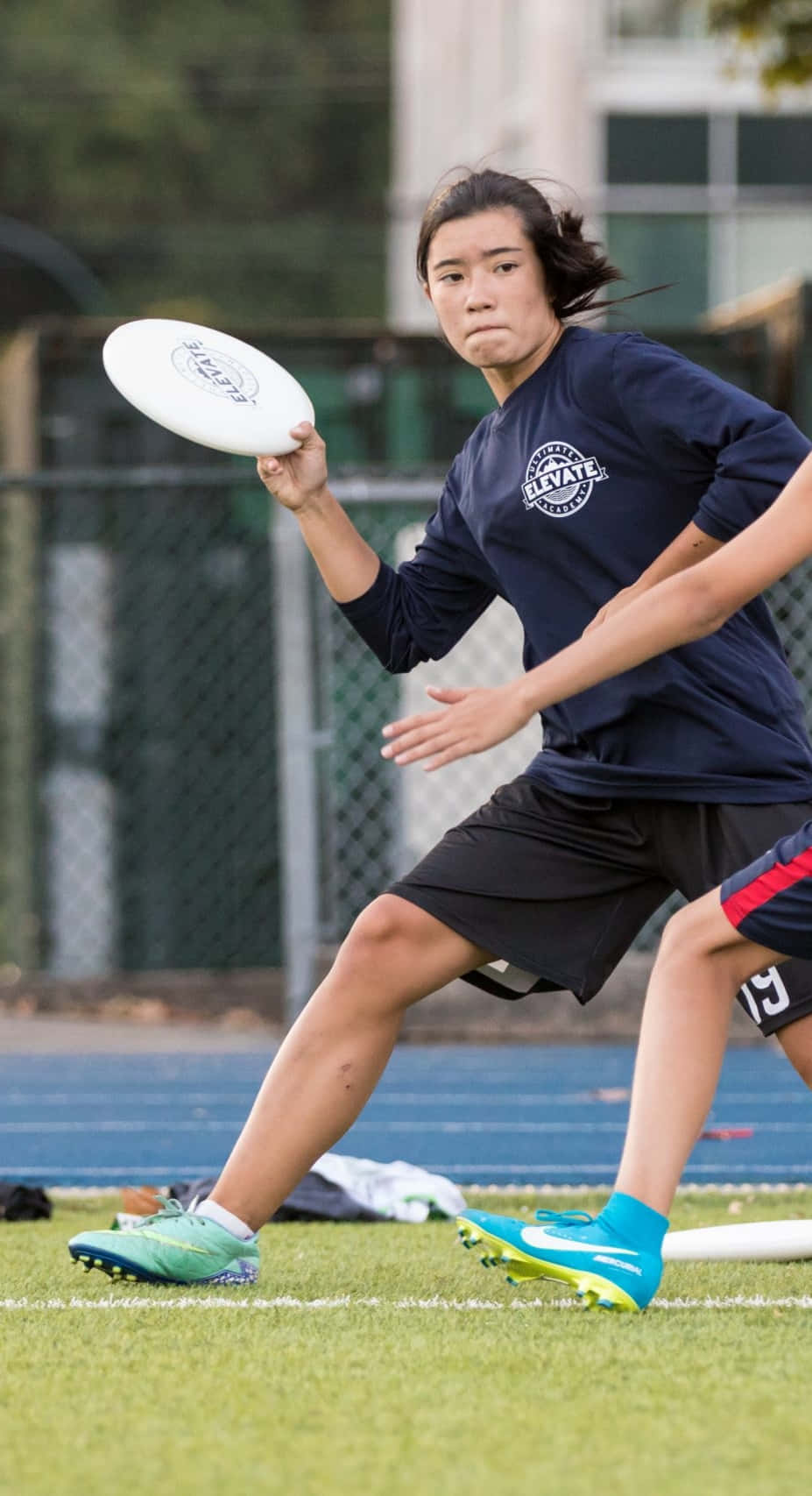 Female Athlete Throwing Android Ultimate Frisbee Background