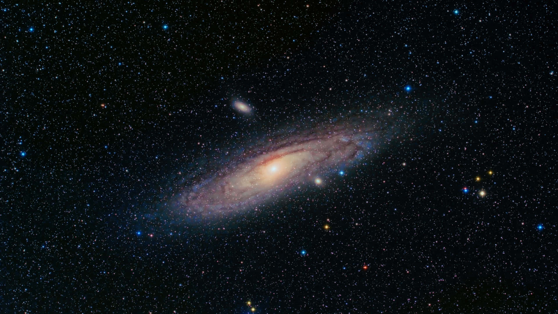 Witness The Splendor Of The Andromeda Galaxy Wallpaper