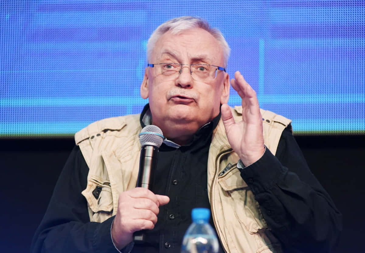 Andrzej Sapkowski During A Book Signing Event Wallpaper