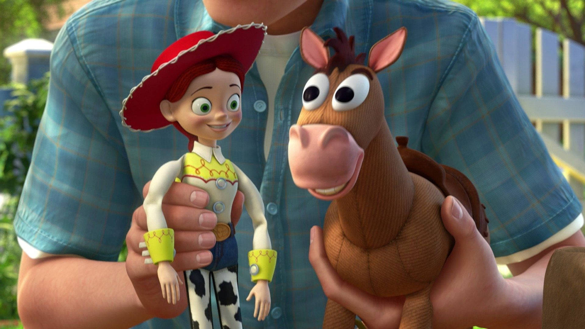Papelde Parede Do Toy Story Com A Imagem Do Andy Segurando O Seu Boneco Preferido, Bullseye. Papel de Parede