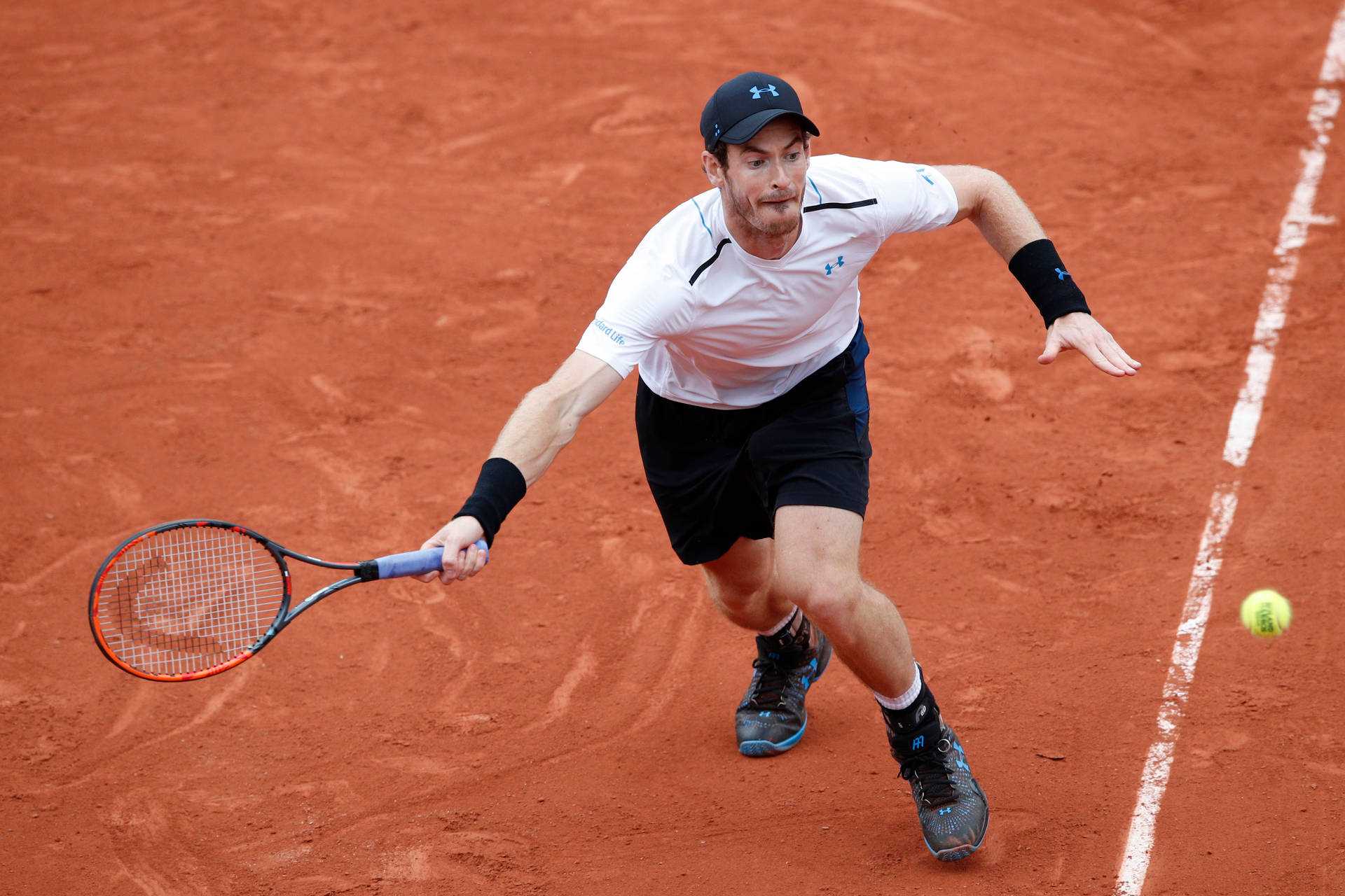 Caption: "Andy Murray in Action - Aiming for the Forehand Drive" Wallpaper