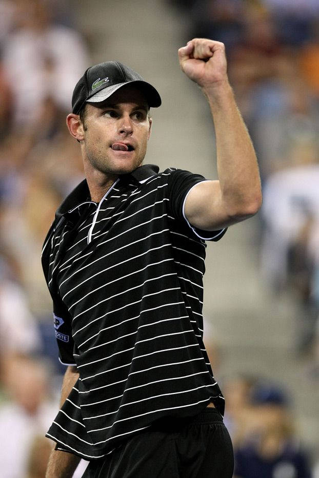 Andy Roddick Celebrating Victory with Raised Arm Wallpaper
