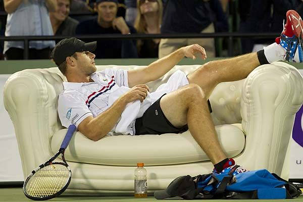 Andy Roddick In Action On The Tennis Court Wallpaper