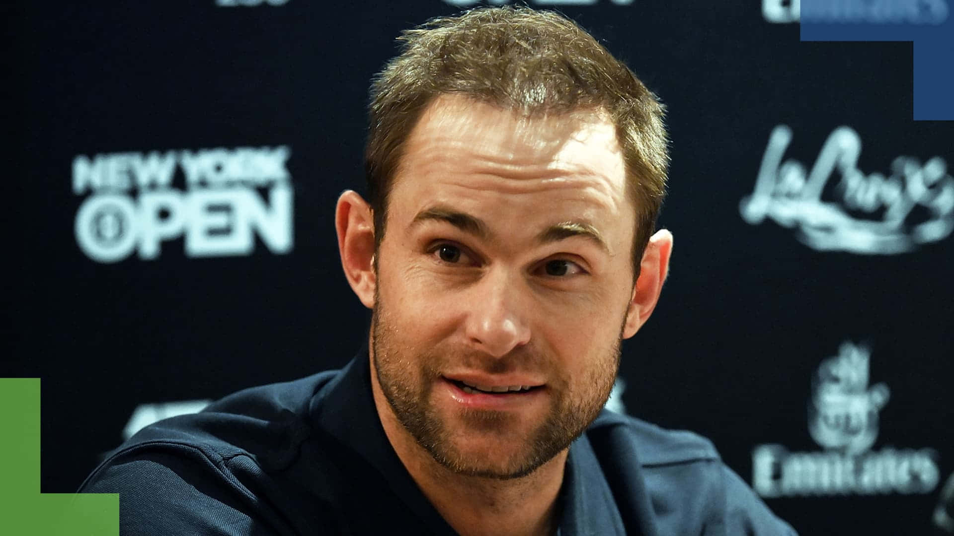 Andy Roddick Smiling During Interview Wallpaper