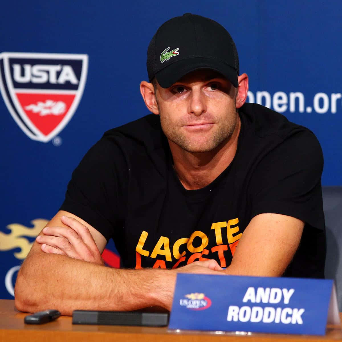 Andy Roddick With Arms Crossed Wallpaper