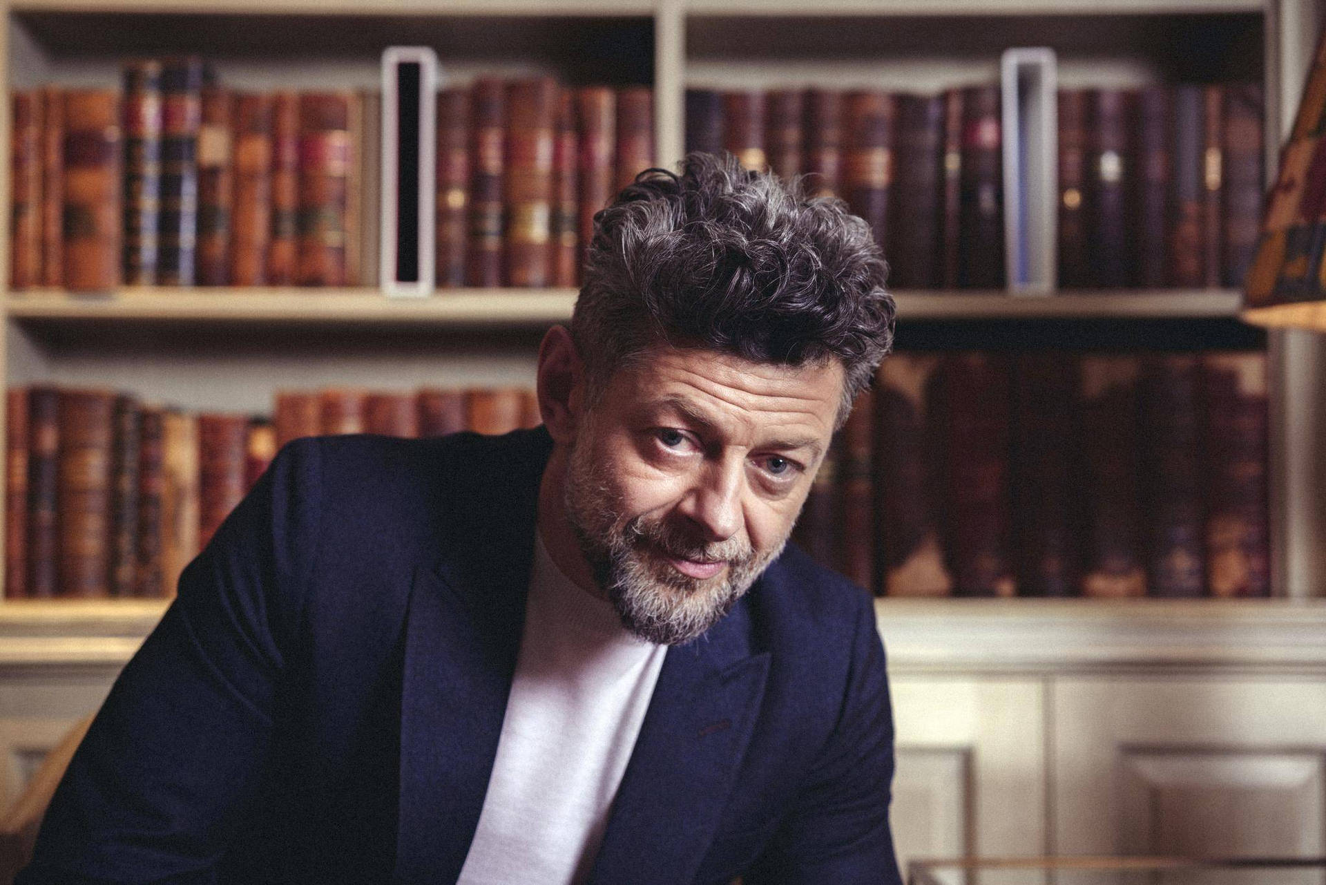 Andy Serkis In Library Wallpaper