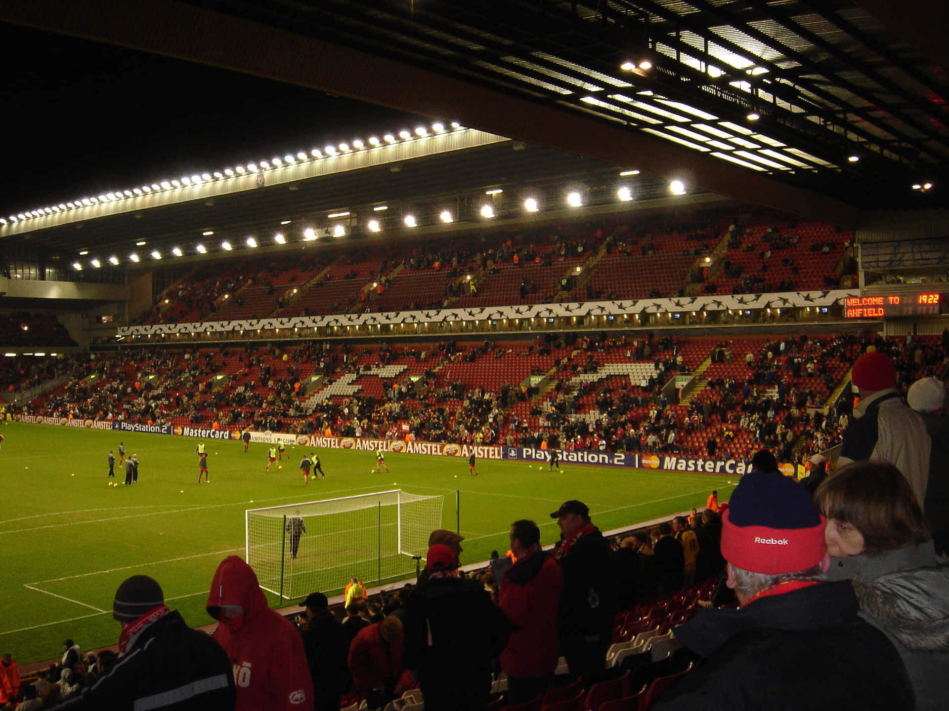 Anfield Stadium Night Match Atmosphere Wallpaper