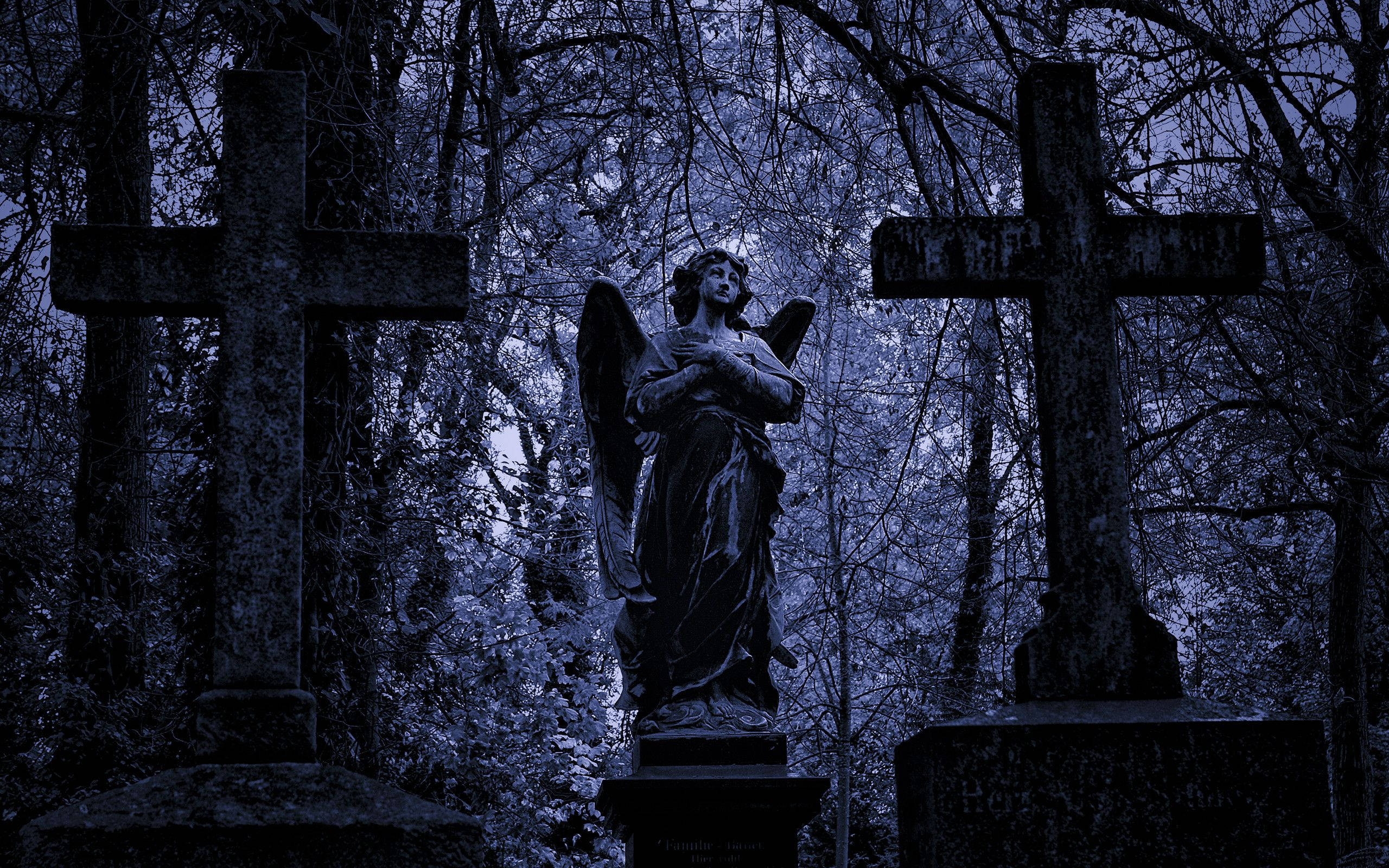 Angel Statue In A Graveyard Wallpaper