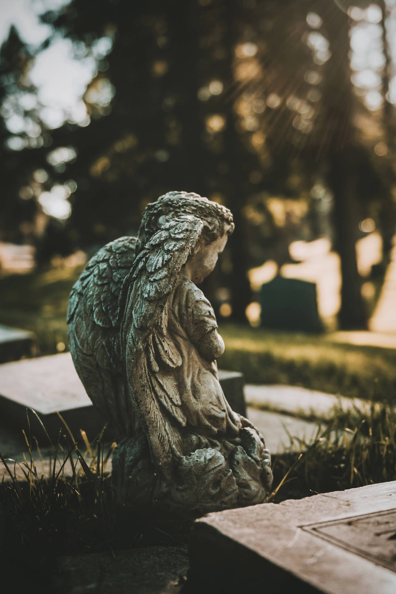 Angel Statue In Cemetery Background