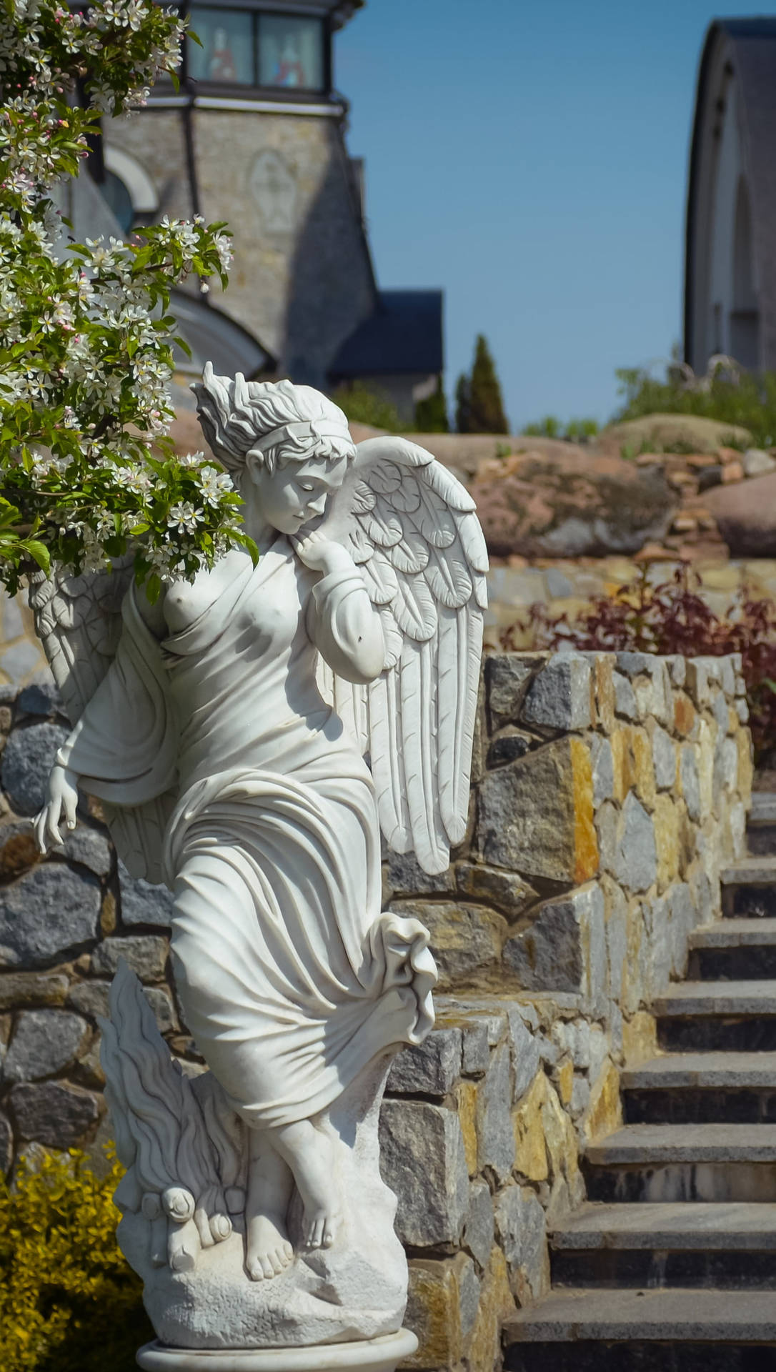 Angel Statue On The Side Of Stairs Wallpaper