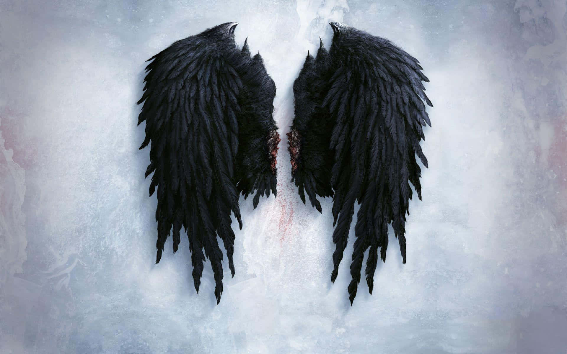 a black angel wings on a white background