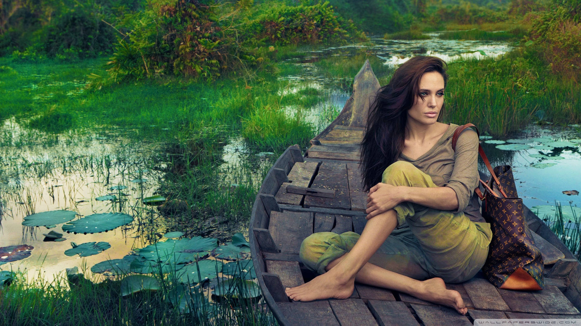 Angelina Jolie Riding A Boat Wallpaper